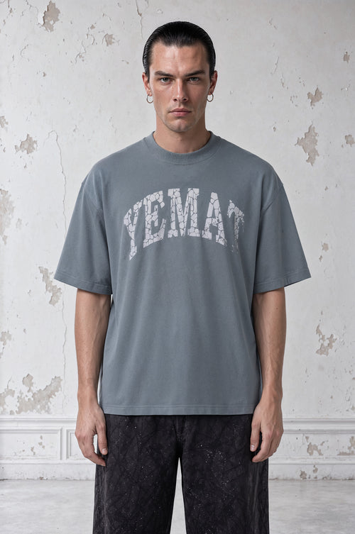 YEMAT Fracture Tee on Leo — half-body front view