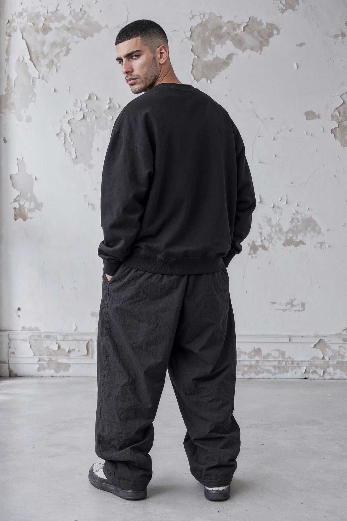 YEMAT Relic Jumper black — back three-quarter, high-resolution master
