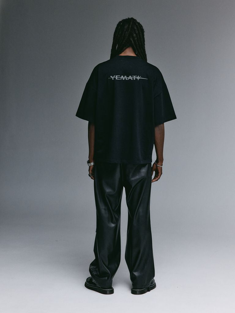 Dante wearing the YEMAT Velvet Tee Black