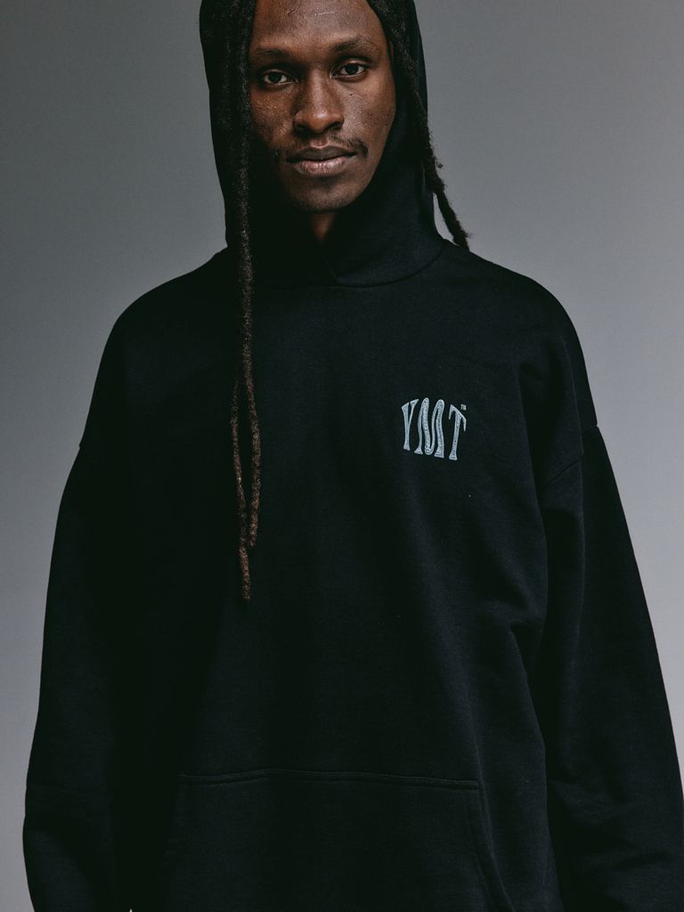 Dante wearing the YEMAT Force Hoodie Black