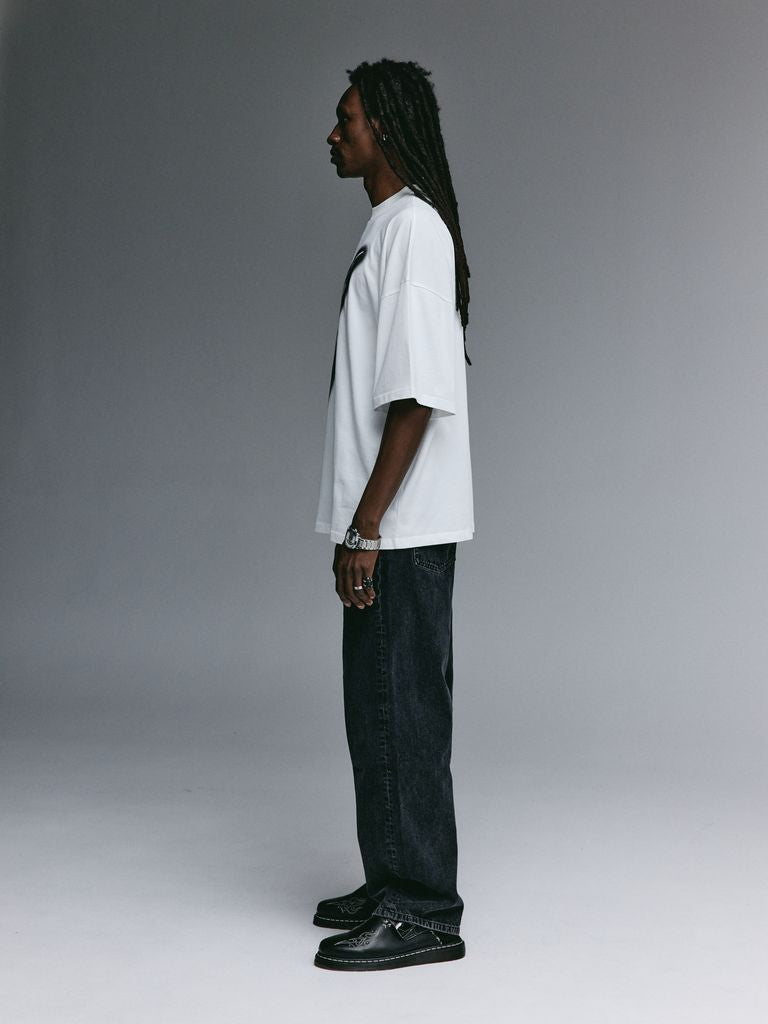 Dante wearing the YEMAT Airbrush Tee