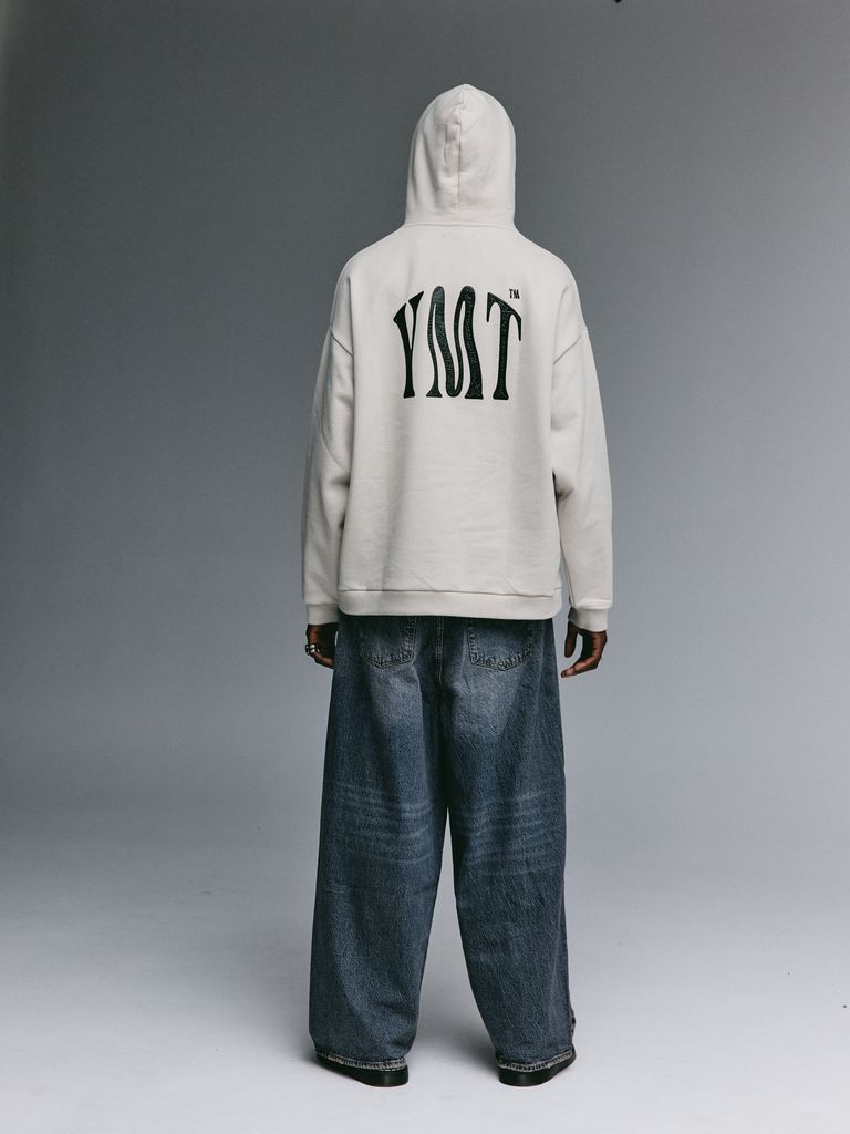Dante wearing the YEMAT Force Hoodie Beige