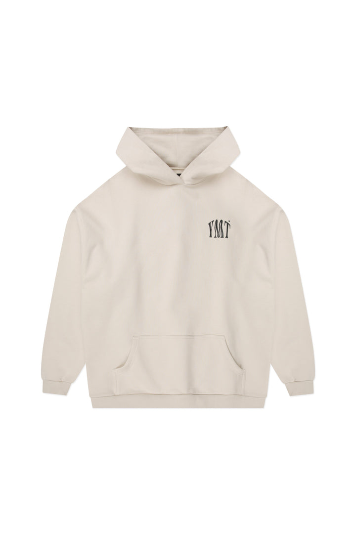 YEMAT Force Hoodie Beige flat lay front showing the full silhouette and YMT chest print, 450 GSM brushed organic cotton fleece