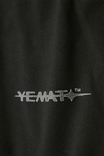 Yemat Velvet Icon Black Tee Yemat velvet logo close up raised detail 240 GSM organic cotton luxury streetwear